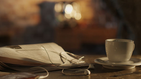 Morning_sun_coffee_newspaper_table_590